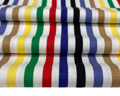 Woven fabrics containing predominantly, but < 85% polyester staple fibres by weight, mixed principally or solely with cotton and