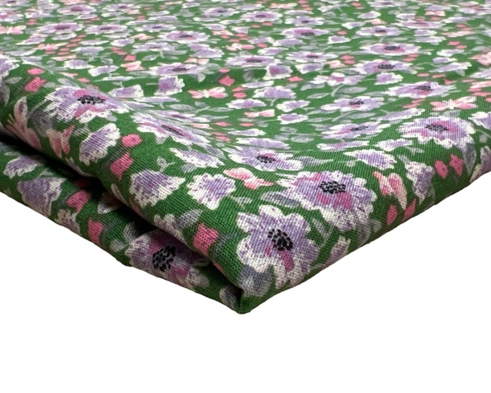 Viscose fabric purple flowers in green - 1