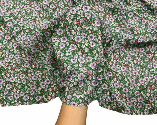 Viscose fabric purple flowers in green - 1