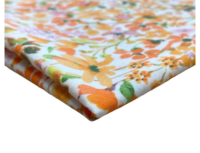 Medvilninis audinys Oranžinės gėlės baltame