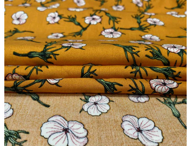 Viscose fabric White flowers in orange pigiau