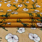 Viscose fabric White flowers in orange pigiau
