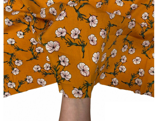 Viscose fabric White flowers in orange internetu