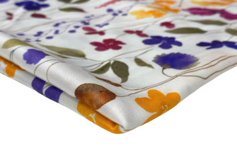 Viscose satin with elastane Coloured flowers in white