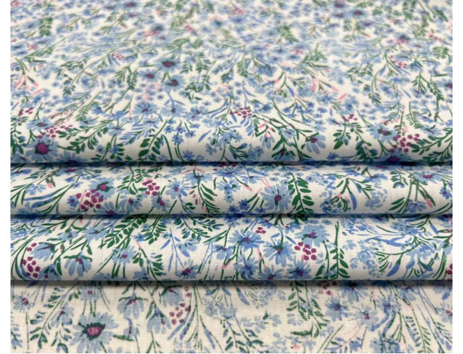 Medvilninis audinys Mėlynos gėlytės baltame pigiau