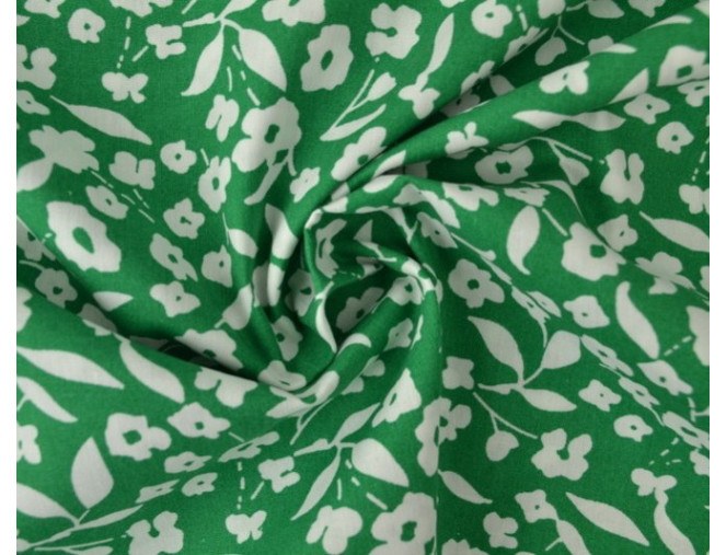 Medvilninis audinys Baltos gėlytės žaliame