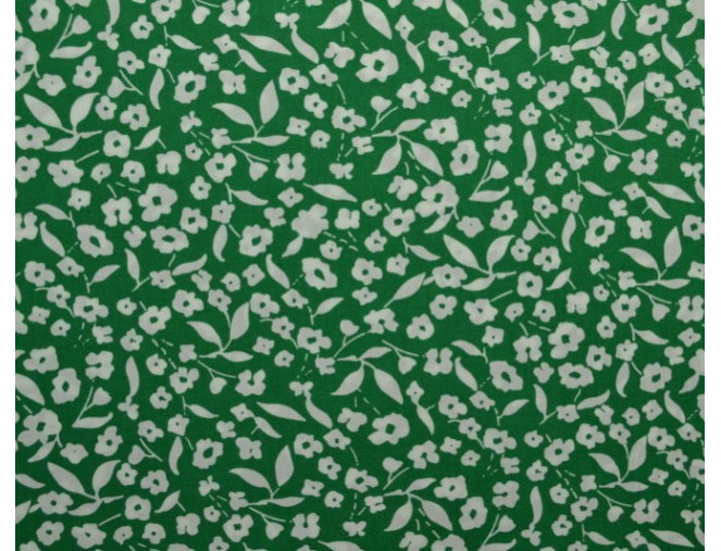 Medvilninis audinys Baltos gėlytės žaliame pigiau
