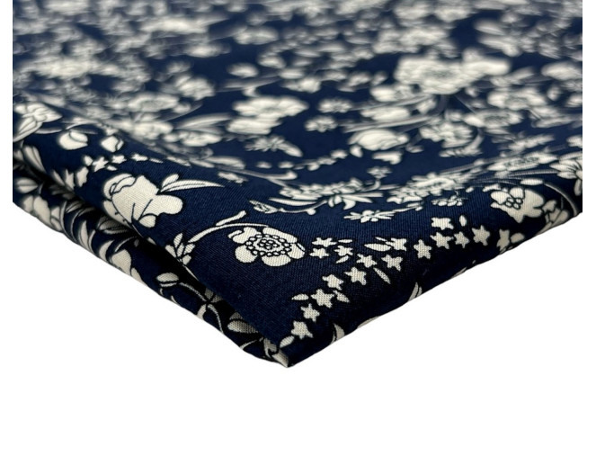 White flowers in dark blue
