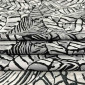 All-woven fabric in black with grey lettering pigiau
