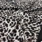 Punto knitted fabric Brown leopard print in grey pigiau
