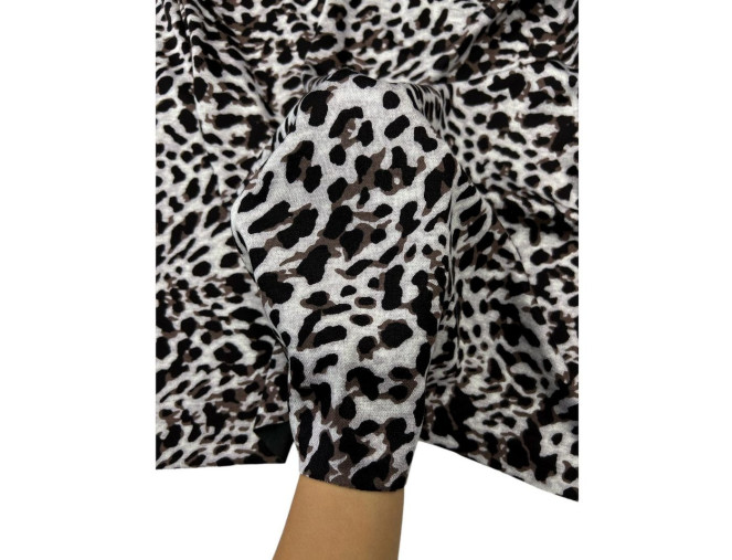 Punto knitted fabric Brown leopard print in grey internetu