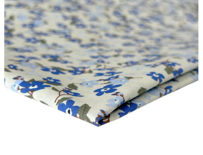 Poplin audinys Mėlynos gėlytės gelsvame