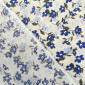 Poplin audinys Mėlynos gėlytės gelsvame pigiau