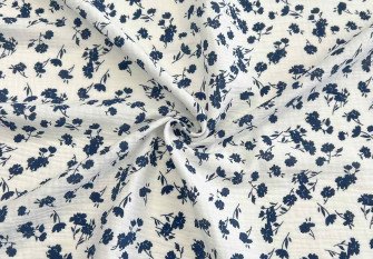Muslinas Tamsiai mėlynos gėlytės baltame