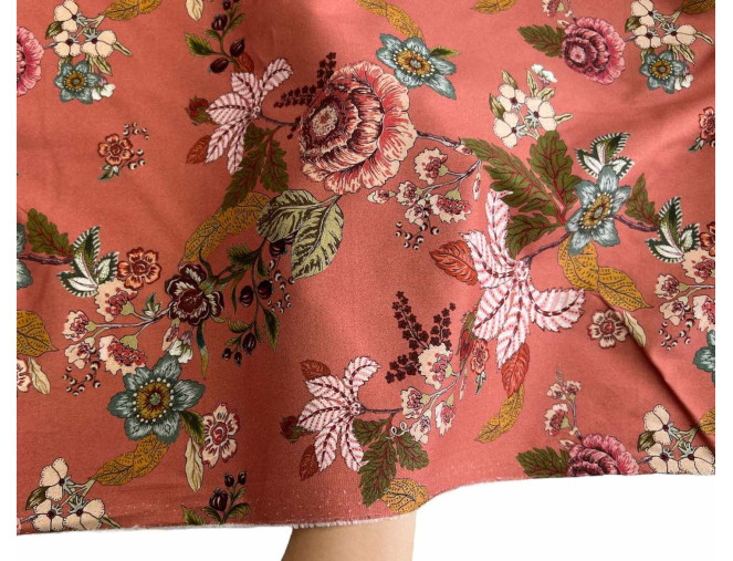 Medvilninis audinys su elastanu Gėlės persikiniame BROKUOTAS pigiau