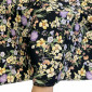 Cotton fabric with elastane Yellow flowers in black pigiau