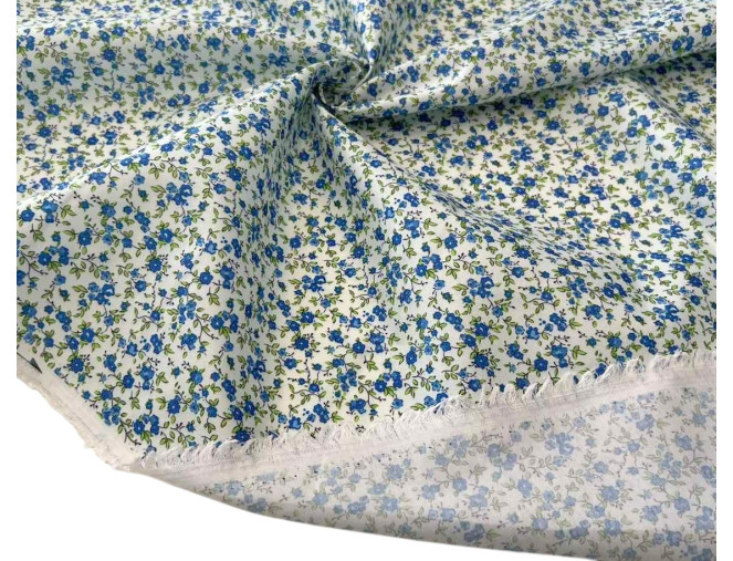 Dress fabric Blue flowers in white pigiau