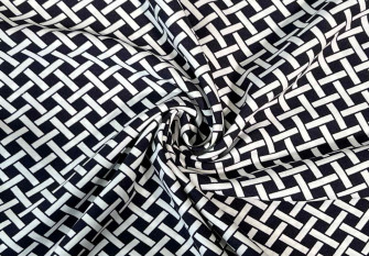 Viscose fabric White patterns in dark blue
