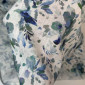 Linen with viscose Greenish-blue spots pigiau