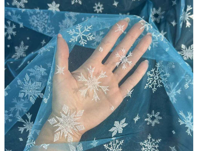 Tulle with shiny snowflakes White internetu