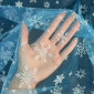 Tulle with shiny snowflakes White internetu