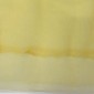 Remnant of stiff yellow tulle, No. 105 pigiau