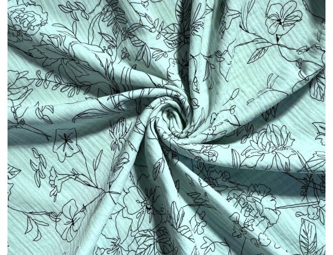 Muslin with floral patterns in mint green