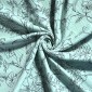 Muslin with floral patterns in mint green
