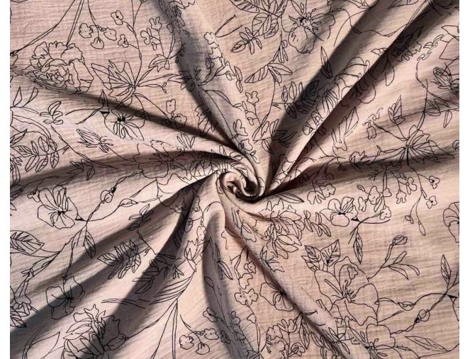 Muslin with floral patterns in ash pink