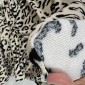 Teddy fabric with leopard print in cream, 320 g/sq m. pigiau