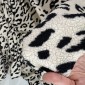 Teddy fabric with leopard print in cream, 320 g/sq m. internetu